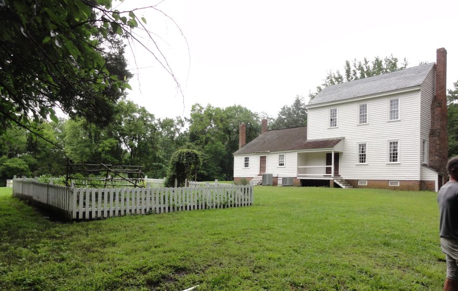 The Bennehan house at historic Stagville sits in an open field.
